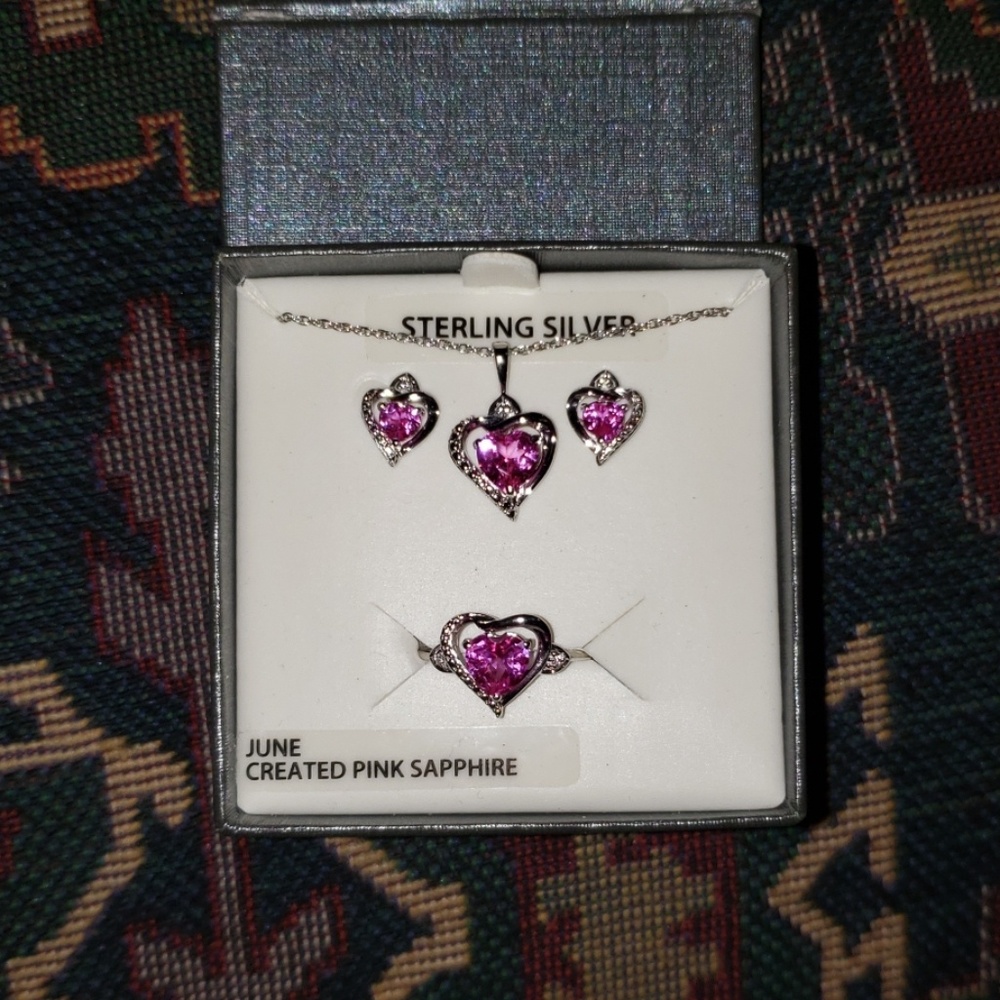 a earring ring and neckalace set